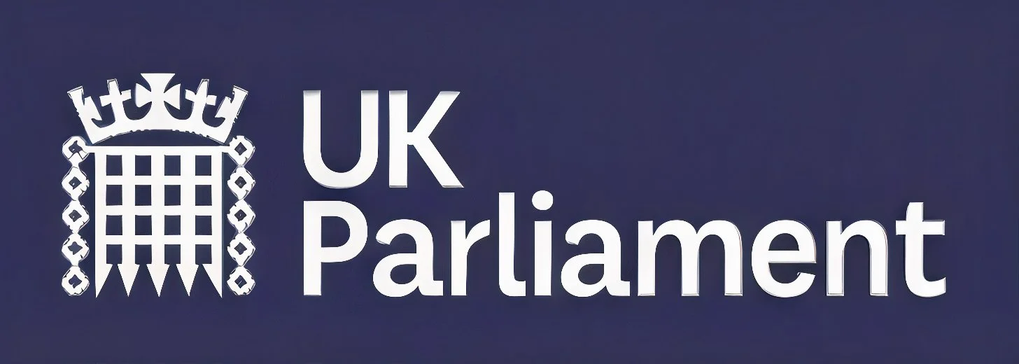 Logo of the UK Parliament featuring a stylized gate with a crown and chained decorative elements, alongside the text 'UK Parliament'