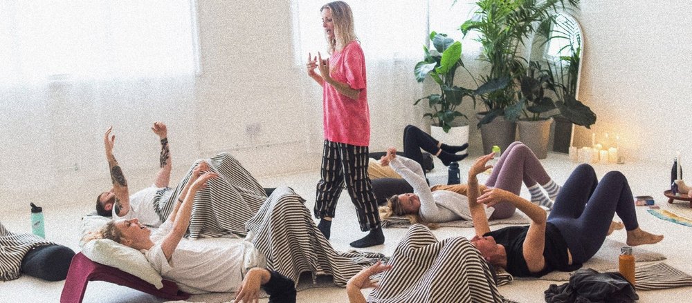 Group breathwork session with instructor